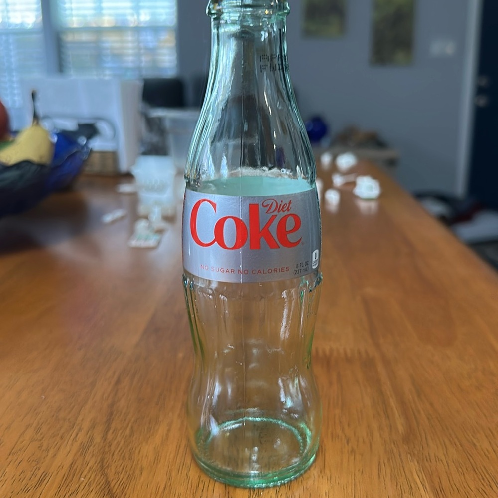 Coke bottle. Diet Coke small 8oz. glass bottle. Silver and Red label. EUC